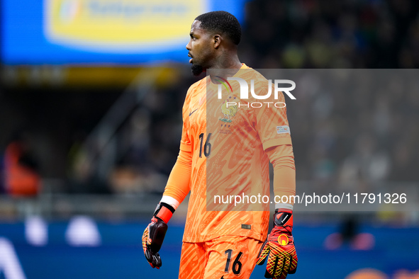 Mike Maignan of France looks on during the UEFA Nations League 2024/25 League A Group 2 match between Italy and France at Stadio Giuseppe Me...