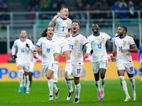 Lucas Digne of France celebrates after scoring second goal during the UEFA Nations League 2024/25 League A Group 2 match between Italy and F...