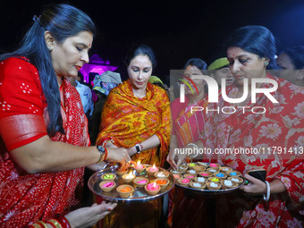 Rajasthan Deputy Chief Minister Diya Kumari and JMC Greater Mayor Somya Gurjar light earthen lamps during the 'Deepdan' celebration on the o...