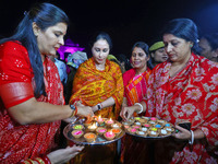 Rajasthan Deputy Chief Minister Diya Kumari and JMC Greater Mayor Somya Gurjar light earthen lamps during the 'Deepdan' celebration on the o...