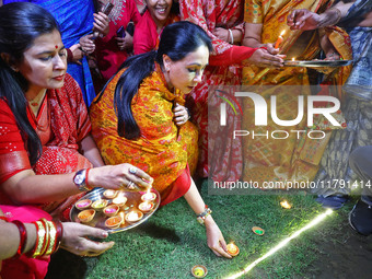 Rajasthan Deputy Chief Minister Diya Kumari and JMC Greater Mayor Somya Gurjar light earthen lamps during the 'Deepdan' celebration on the o...