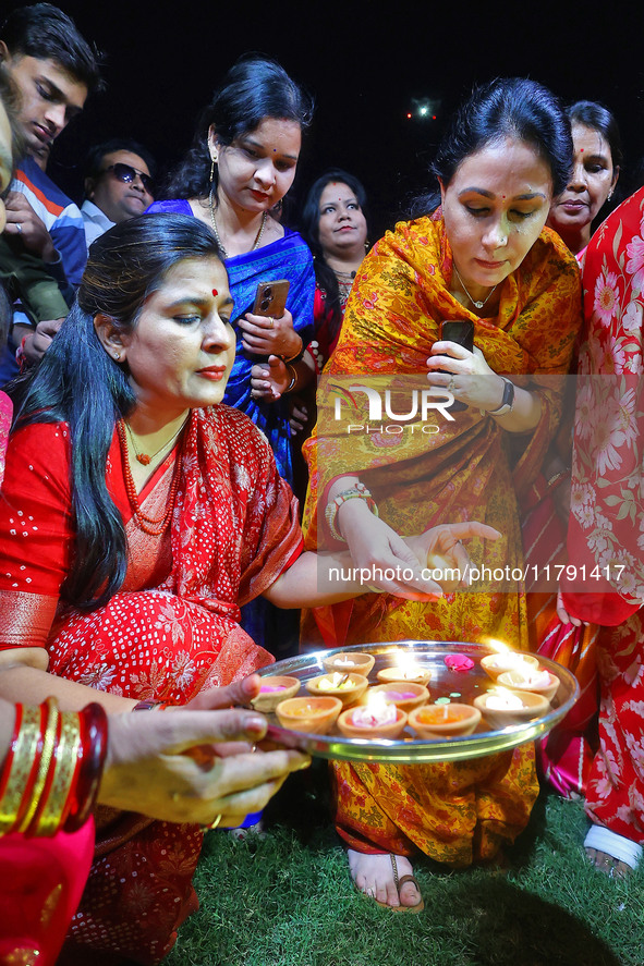 Rajasthan Deputy Chief Minister Diya Kumari and JMC Greater Mayor Somya Gurjar light earthen lamps during the 'Deepdan' celebration on the o...