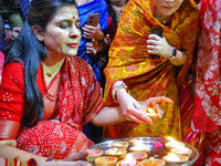 Rajasthan Deputy Chief Minister Diya Kumari and JMC Greater Mayor Somya Gurjar light earthen lamps during the 'Deepdan' celebration on the o...