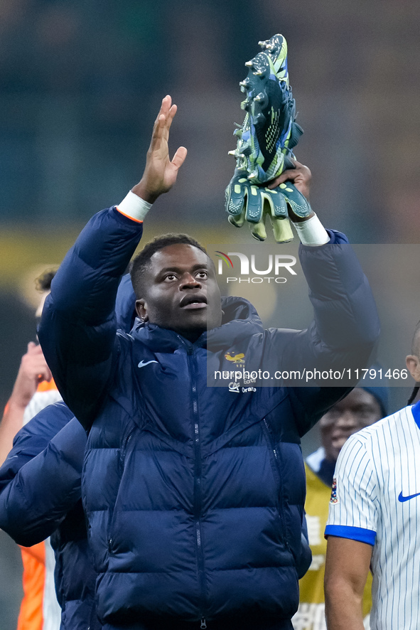 Brice Samba of France greets the fans at the end of the UEFA Nations League 2024/25 League A Group 2 match between Italy and France at Stadi...