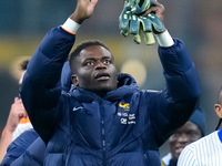 Brice Samba of France greets the fans at the end of the UEFA Nations League 2024/25 League A Group 2 match between Italy and France at Stadi...