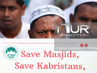 Indian Muslims shout slogans during a protest against the Anti-Waqf Amendment Bill in Kolkata, India, on November 19, 2024. More than 60 tho...