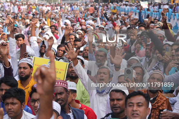 Indian Muslims shout slogans during a protest against the Anti-Waqf Amendment Bill in Kolkata, India, on November 19, 2024. More than 60 tho...