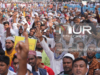 Indian Muslims shout slogans during a protest against the Anti-Waqf Amendment Bill in Kolkata, India, on November 19, 2024. More than 60 tho...