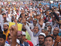 Indian Muslims shout slogans during a protest against the Anti-Waqf Amendment Bill in Kolkata, India, on November 19, 2024. More than 60 tho...