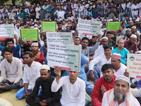 Indian Muslims shout slogans during a protest against the Anti-Waqf Amendment Bill in Kolkata, India, on November 19, 2024. More than 60 tho...