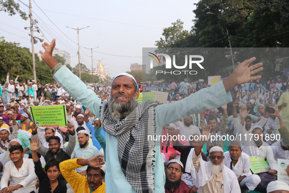 Indian Muslims shout slogans during a protest against the Anti-Waqf Amendment Bill in Kolkata, India, on November 19, 2024. More than 60 tho...