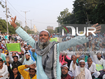 Indian Muslims shout slogans during a protest against the Anti-Waqf Amendment Bill in Kolkata, India, on November 19, 2024. More than 60 tho...