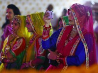 Folk artists perform during the celebration of the 297th foundation day of 'Pink City' at Albert Hall Museum in Jaipur, Rajasthan, India, on...