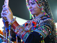 A folk artist performs during the celebration of the 297th foundation day of 'Pink City' at Albert Hall Museum in Jaipur, Rajasthan, India,...