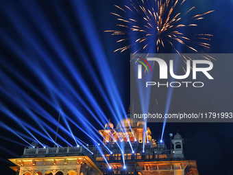 Fireworks light the sky over the historical Albert Hall Museum during the celebration of the 297th foundation day of 'Pink City' in Jaipur,...