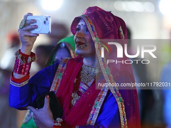 A folk artist performs during the celebration of the 297th foundation day of 'Pink City' at Albert Hall Museum in Jaipur, Rajasthan, India,...