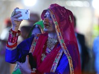 A folk artist performs during the celebration of the 297th foundation day of 'Pink City' at Albert Hall Museum in Jaipur, Rajasthan, India,...