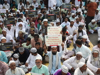 Activists of The All India Youth Federation (AIYF) take part in a protest meeting in Kolkata, India, on November 19, 2024, demanding the wit...