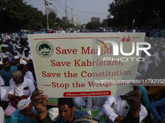 Activists of The All India Youth Federation (AIYF) take part in a protest meeting in Kolkata, India, on November 19, 2024, demanding the wit...