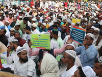 Activists of The All India Youth Federation (AIYF) take part in a protest meeting in Kolkata, India, on November 19, 2024, demanding the wit...