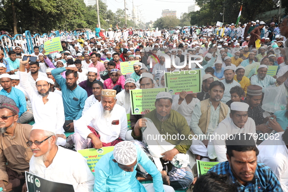 Activists of The All India Youth Federation (AIYF) take part in a protest meeting in Kolkata, India, on November 19, 2024, demanding the wit...