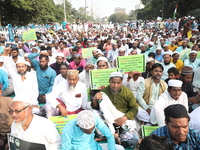 Activists of The All India Youth Federation (AIYF) take part in a protest meeting in Kolkata, India, on November 19, 2024, demanding the wit...