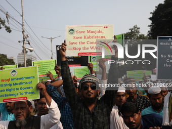 Activists of The All India Youth Federation (AIYF) take part in a protest meeting in Kolkata, India, on November 19, 2024, demanding the wit...