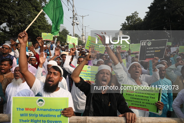 Activists of The All India Youth Federation (AIYF) take part in a protest meeting in Kolkata, India, on November 19, 2024, demanding the wit...