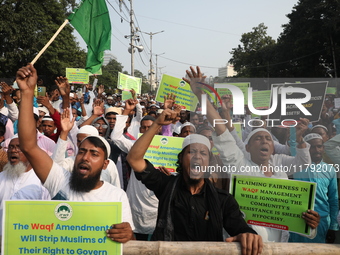 Activists of The All India Youth Federation (AIYF) take part in a protest meeting in Kolkata, India, on November 19, 2024, demanding the wit...