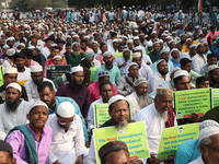 Activists of The All India Youth Federation (AIYF) take part in a protest meeting in Kolkata, India, on November 19, 2024, demanding the wit...