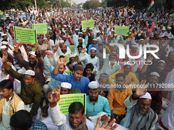 Activists of The All India Youth Federation (AIYF) take part in a protest meeting in Kolkata, India, on November 19, 2024, demanding the wit...