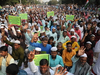 Activists of The All India Youth Federation (AIYF) take part in a protest meeting in Kolkata, India, on November 19, 2024, demanding the wit...