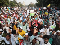 Activists of The All India Youth Federation (AIYF) take part in a protest meeting in Kolkata, India, on November 19, 2024, demanding the wit...