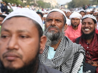 Activists of The All India Youth Federation (AIYF) take part in a protest meeting in Kolkata, India, on November 19, 2024, demanding the wit...