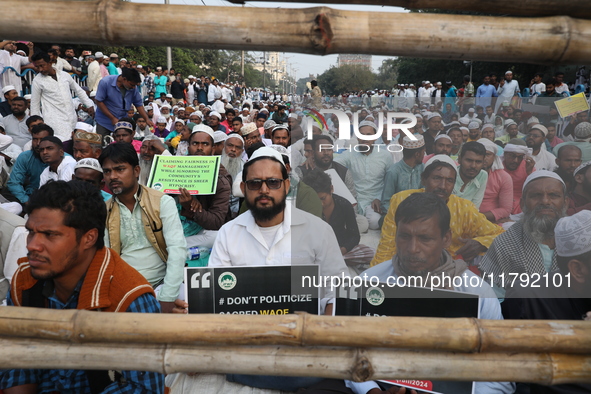 Activists of The All India Youth Federation (AIYF) take part in a protest meeting in Kolkata, India, on November 19, 2024, demanding the wit...