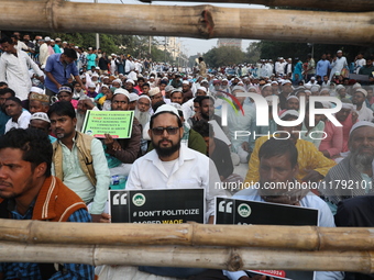 Activists of The All India Youth Federation (AIYF) take part in a protest meeting in Kolkata, India, on November 19, 2024, demanding the wit...