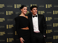 Marc Marquez of Spain and Gresini Racing Moto GP Ducati with his girlfriend Gemma Pinto on the red carpet before the MotoGP Awards after the...