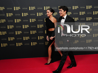 Marc Marquez of Spain and Gresini Racing Moto GP Ducati with his girlfriend Gemma Pinto on the red carpet before the MotoGP Awards after the...