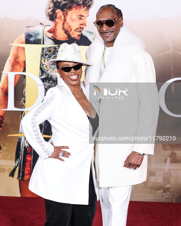 Shante Broadus and husband Snoop Dogg (Calvin Broadus Jr.) arrive at the Los Angeles Premiere Of Paramount Pictures' 'Gladiator II' held at...