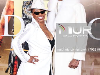 Shante Broadus and husband Snoop Dogg (Calvin Broadus Jr.) arrive at the Los Angeles Premiere Of Paramount Pictures' 'Gladiator II' held at...