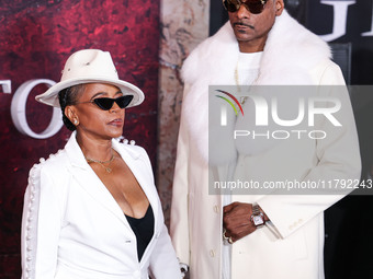 Shante Broadus and husband Snoop Dogg (Calvin Broadus Jr.) arrive at the Los Angeles Premiere Of Paramount Pictures' 'Gladiator II' held at...