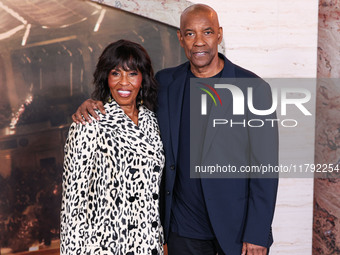 Pauletta Washington and husband Denzel Washington arrive at the Los Angeles Premiere Of Paramount Pictures' 'Gladiator II' held at the TCL C...