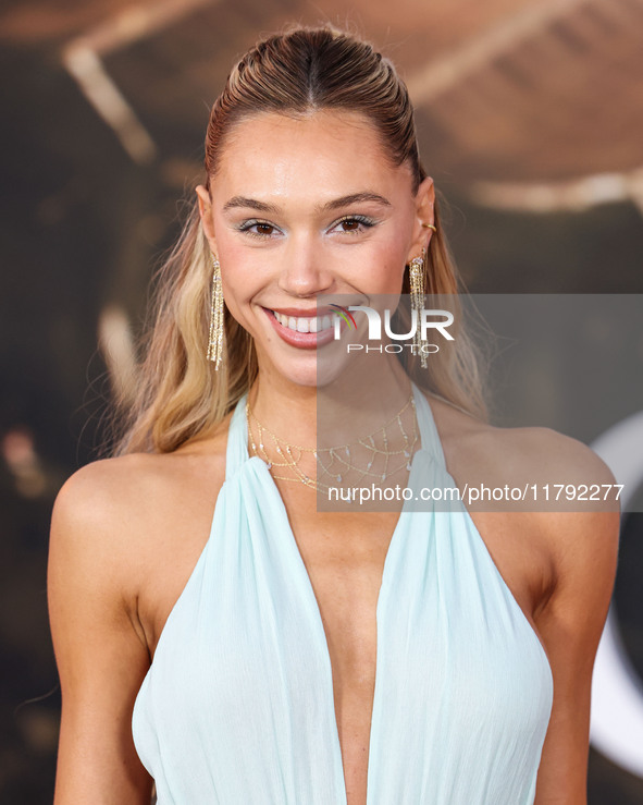 Alexis Ren arrives at the Los Angeles Premiere Of Paramount Pictures' 'Gladiator II' held at the TCL Chinese Theatre IMAX on November 18, 20...