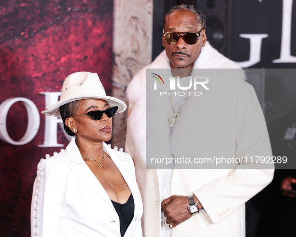 Shante Broadus and husband Snoop Dogg (Calvin Broadus Jr.) arrive at the Los Angeles Premiere Of Paramount Pictures' 'Gladiator II' held at...