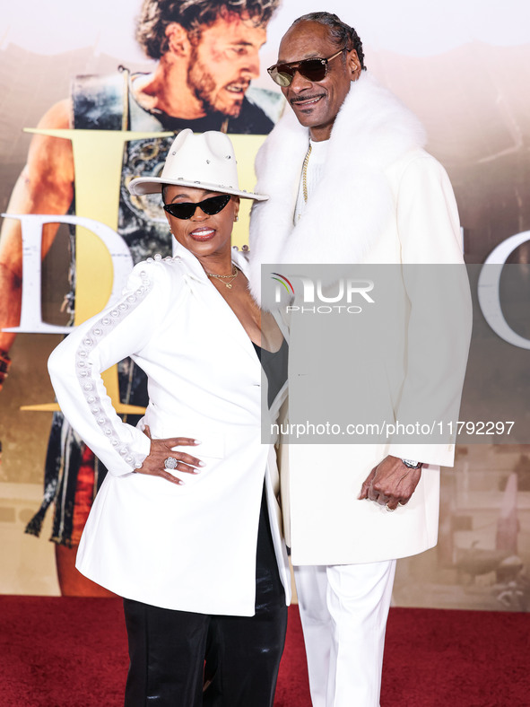 Shante Broadus and husband Snoop Dogg (Calvin Broadus Jr.) arrive at the Los Angeles Premiere Of Paramount Pictures' 'Gladiator II' held at...