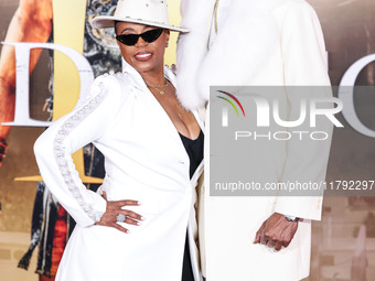 Shante Broadus and husband Snoop Dogg (Calvin Broadus Jr.) arrive at the Los Angeles Premiere Of Paramount Pictures' 'Gladiator II' held at...