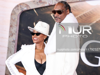 Shante Broadus and husband Snoop Dogg (Calvin Broadus Jr.) arrive at the Los Angeles Premiere Of Paramount Pictures' 'Gladiator II' held at...