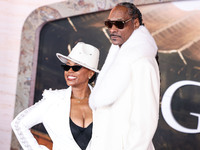 Shante Broadus and husband Snoop Dogg (Calvin Broadus Jr.) arrive at the Los Angeles Premiere Of Paramount Pictures' 'Gladiator II' held at...