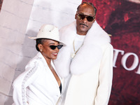 Shante Broadus and husband Snoop Dogg (Calvin Broadus Jr.) arrive at the Los Angeles Premiere Of Paramount Pictures' 'Gladiator II' held at...