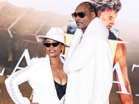 Shante Broadus and husband Snoop Dogg (Calvin Broadus Jr.) arrive at the Los Angeles Premiere Of Paramount Pictures' 'Gladiator II' held at...